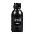 A matte black bottle of Lakrids by Bülow Syrup liquid liquorice, featuring a ribbed black cap and a minimalist black label with white text, set against a plain white background.