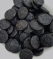 Pontefract cakes - traditional English soft sweet liquorice cakes