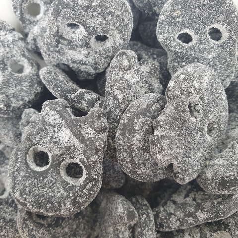 close-up of black liquorice salty skull sweets
